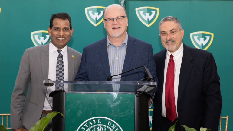 Governors Sunny Reddy (left) and Michael Busuito (right) took the oath of office at a ceremony including friends, family and dignitaries, including Michigan Senator Jim Runestad (center).