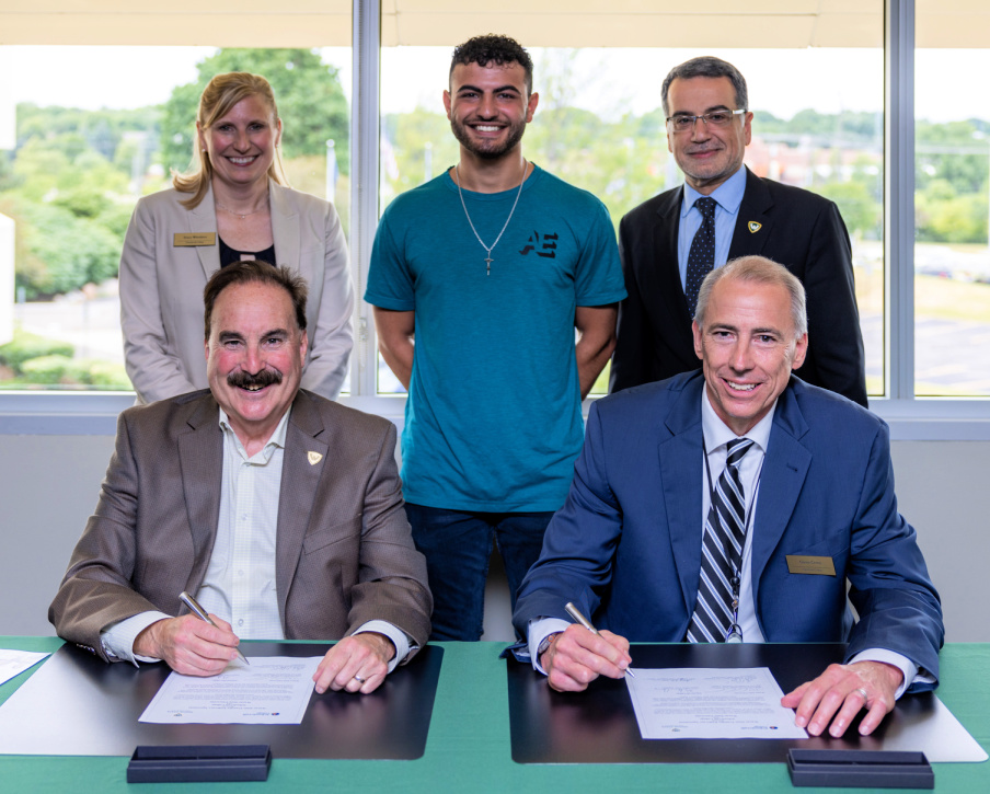 Officials from Wayne State University and Schoolcraft College gathered to celebrate an expanded agreement that provides transfer students with a clear pathway from an associate degree to a bachelor's.