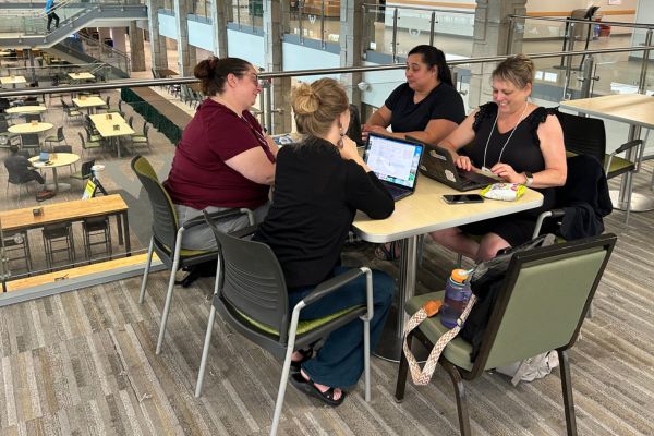 Four SEED Pathways students meeting in the Student Center