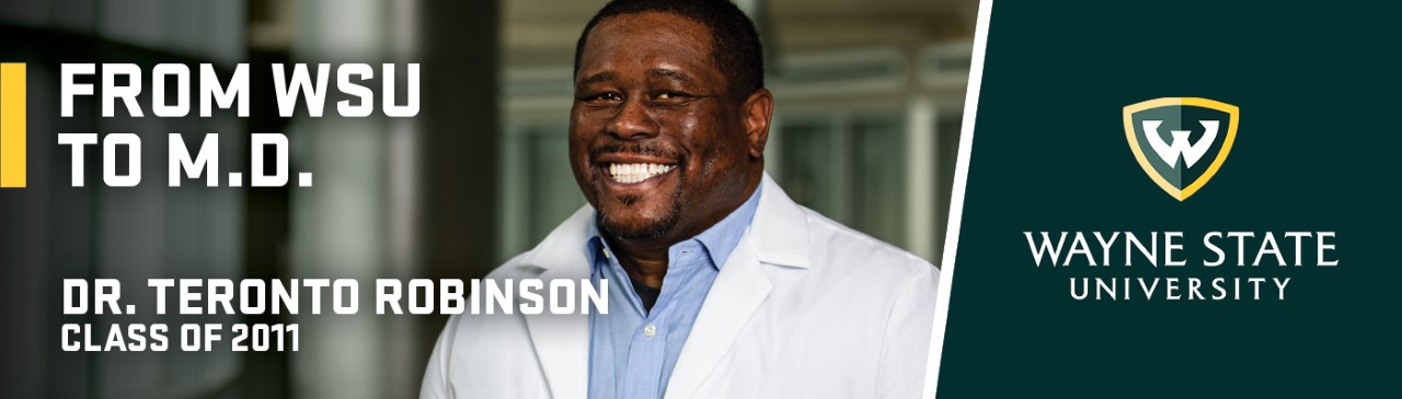 Teronto Robinson is seen on a billboard that reads WSU to M.D.