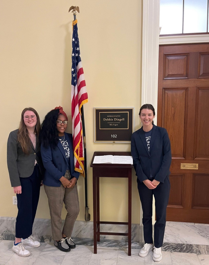 SciPol-Detroit members pose for a photo outside the office of U.S. Rep. Debbie Dingell.