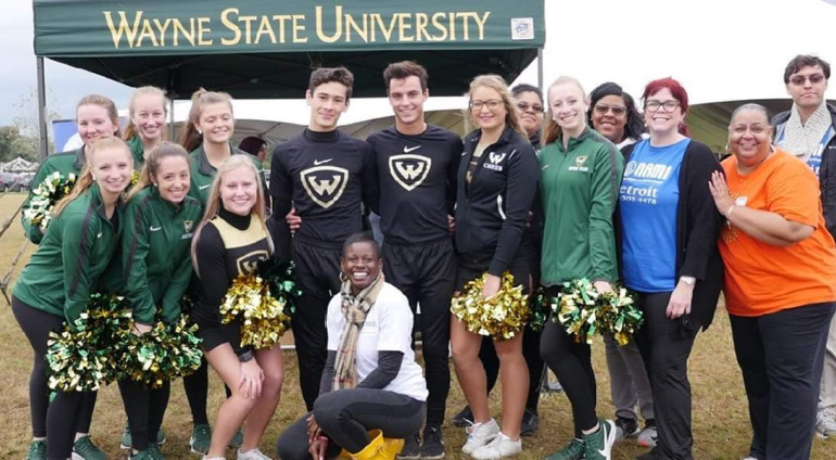 Wayne State students and employees pose for a photo at the NAMIWalks event.