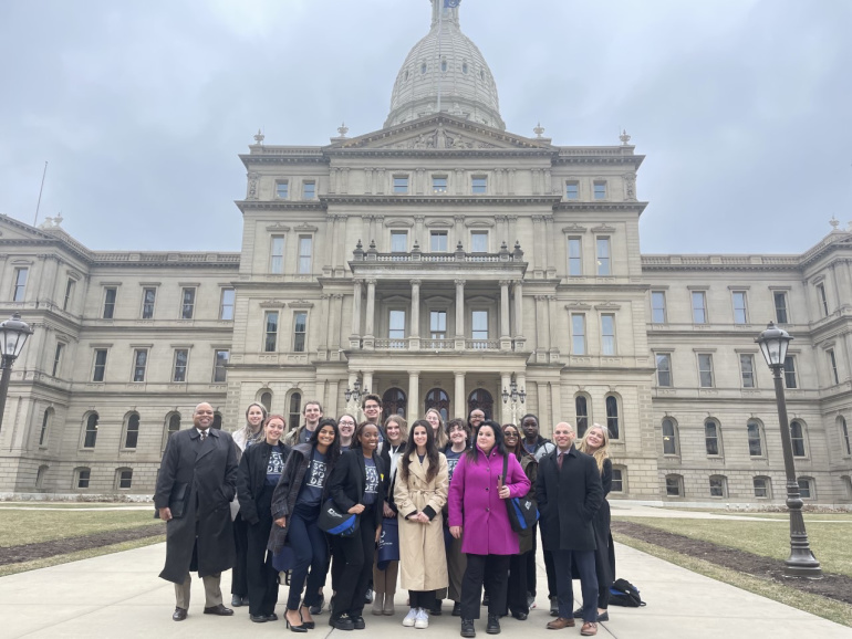 The entire SciPol-Detroit group with Wayne State’s Government and Community Affairs staff stopped to take a photo in front of the capitol building.