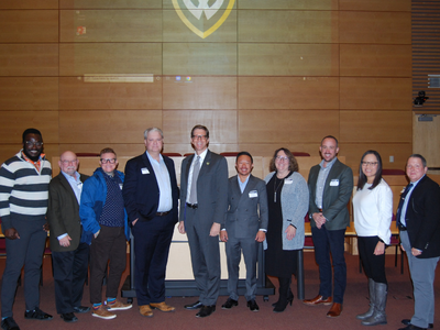 Pictured from left to right are on-campus presenters and moderators of the symposium: J. Lloyd Allen, James Green, M. Killian Kinney, Ted Hutchinson, Richard A. Bierschbach, Alexander Chen, Heather Walter-McCabe, Kellan Baker and Luisa Kcomt. 