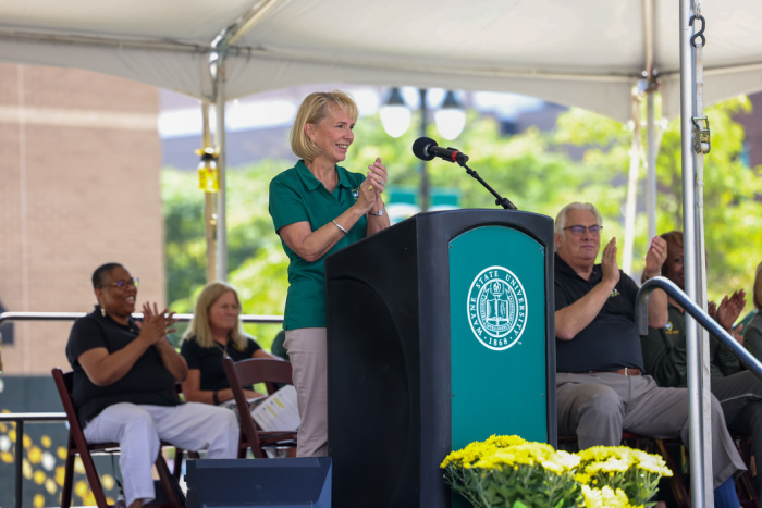 Wayne State University President Kimberly Andrews Espy, Ph.D. claps during her speech at New Student Convocation.