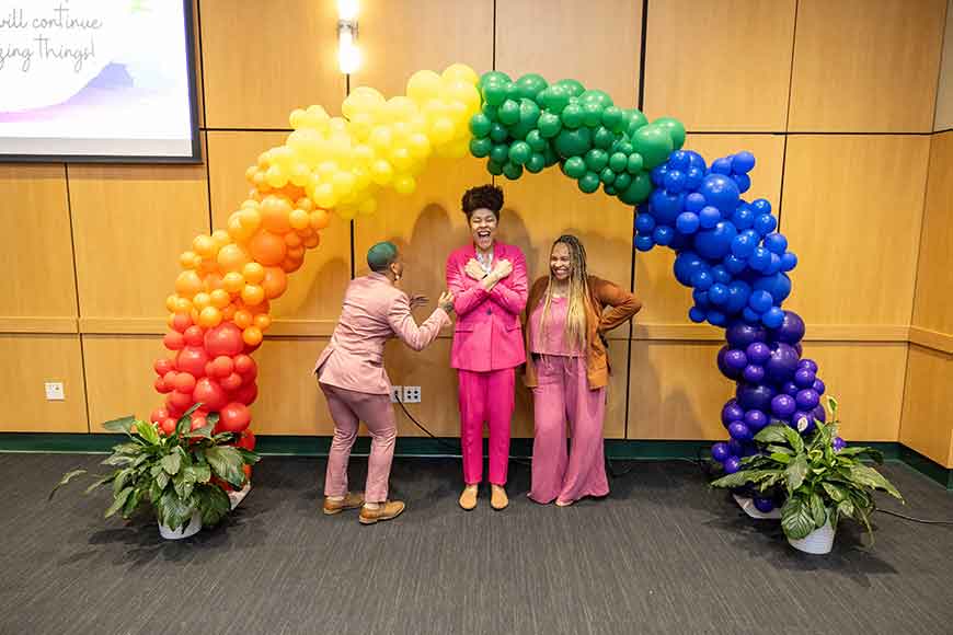 Three members of the Wayne State University community at the 2024 Rainbow Graduation and Homecoming.
