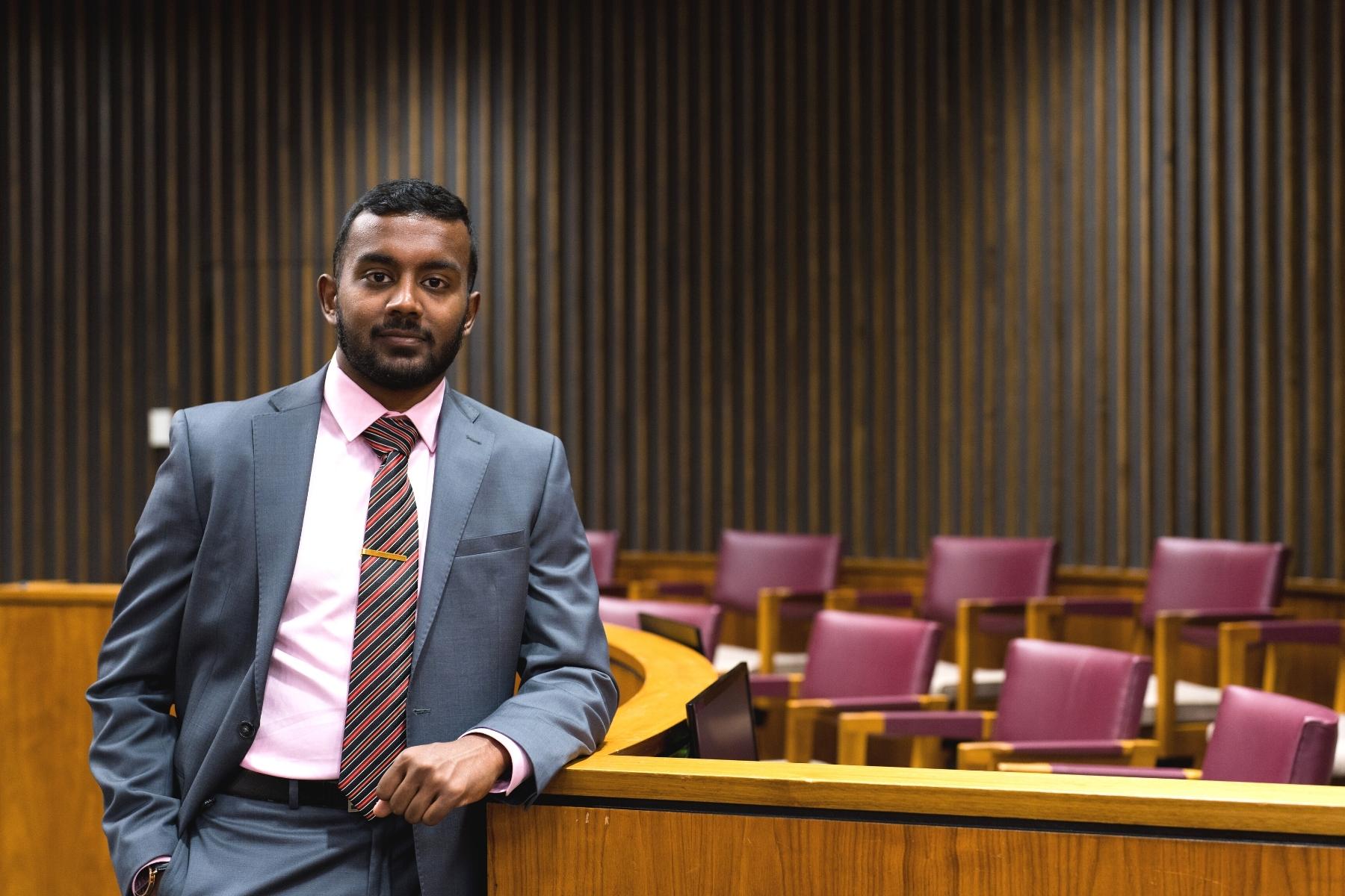 Wayne Law graduating student Muthu Veerappan standing in court