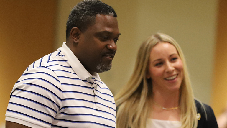 Athletic director Erika Wallace introduced new football coach Tyrone Wheatley at the Board of Governors meeting at the Student Center Building on June 22.