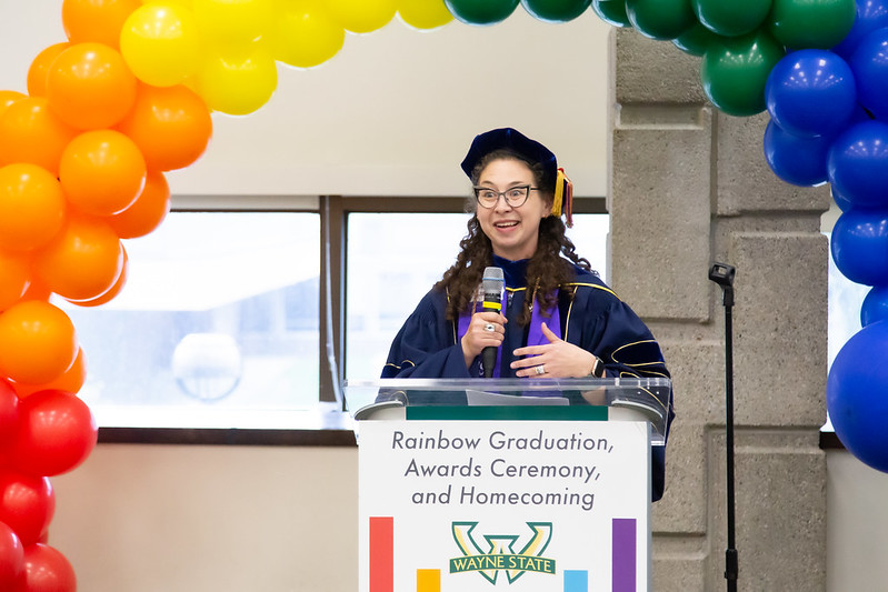 Simone Chess speaking at Wayne State’s rainbow graduation.